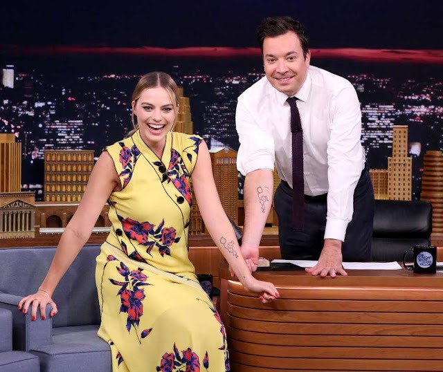 Stamp of approval! Margot Robbie wears pretty floral dress as Jimmy ...